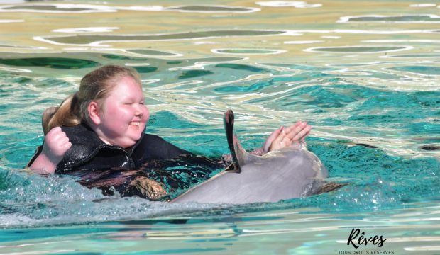 Marion a nagé avec les dauphins